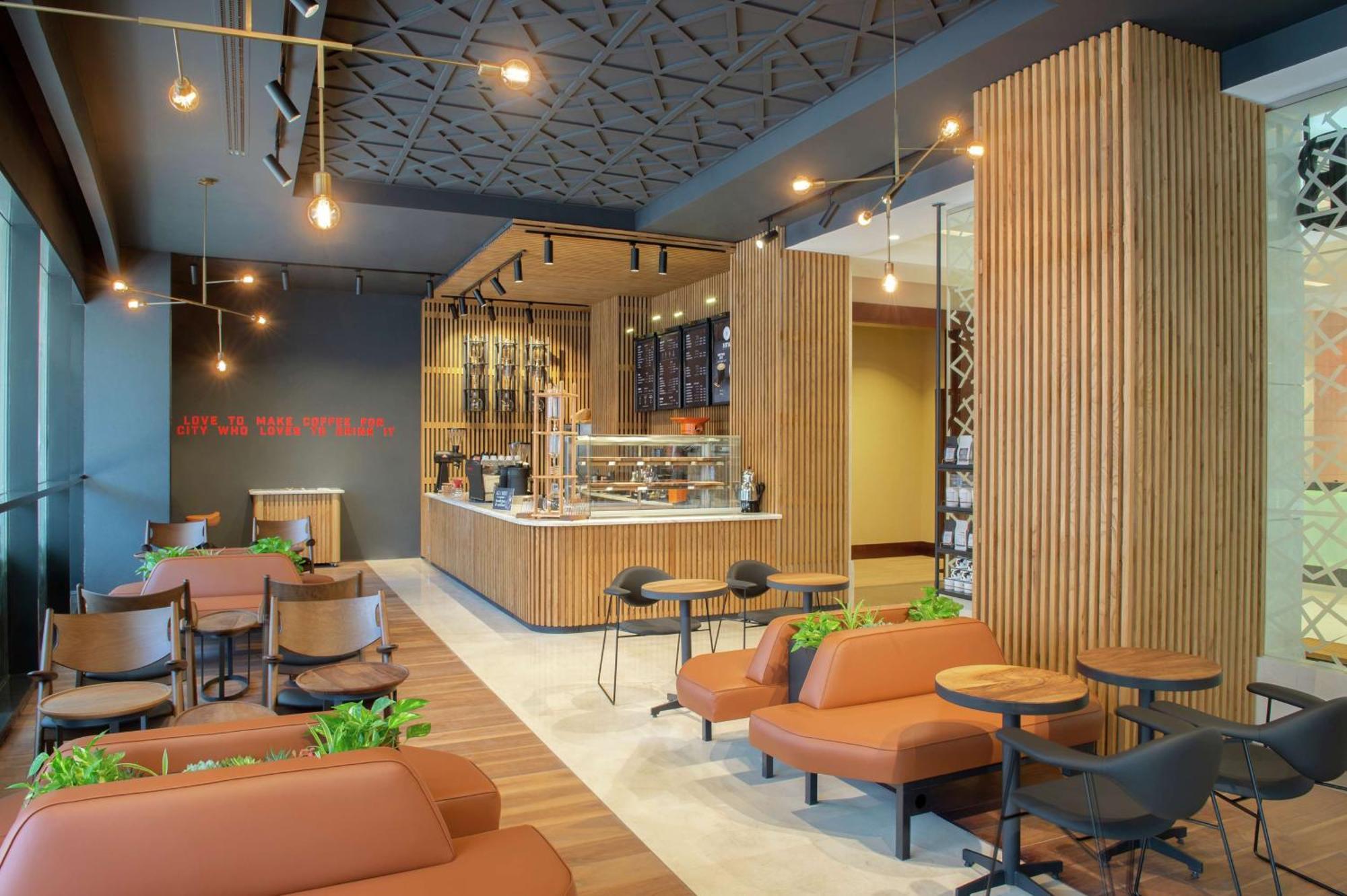 Hotel Doubletree By Hilton Doha - Al Sadd Exterior foto Interior of a Starbucks Reserve store in Seoul, South Korea